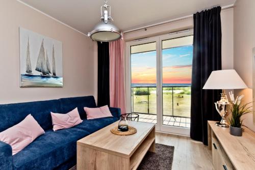 Ruang duduk di BlueApart Apartamenty Na Plaży Jastarnia