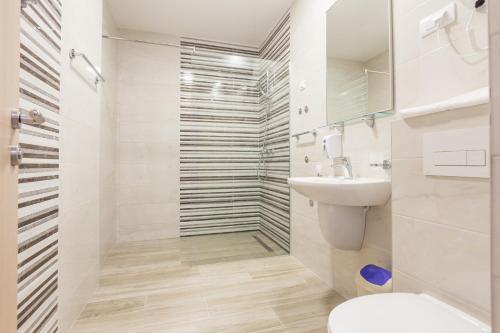 Koupelna v ubytování Adriatik Lux Apartments