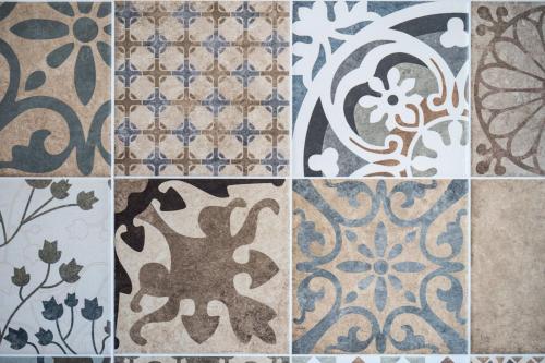 a collage of different types of floor tiles at Plaza Filellinon in Nafplio