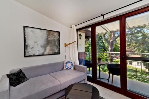 Posezení v ubytování Apartamenty.in Jurata