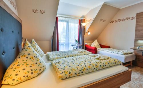מיטה או מיטות בחדר ב-Hotel-Restaurant zum Ochsen