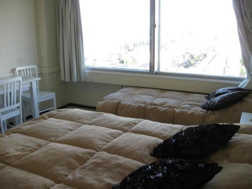 Cama o camas de una habitación en Apartamento Bariloche Center