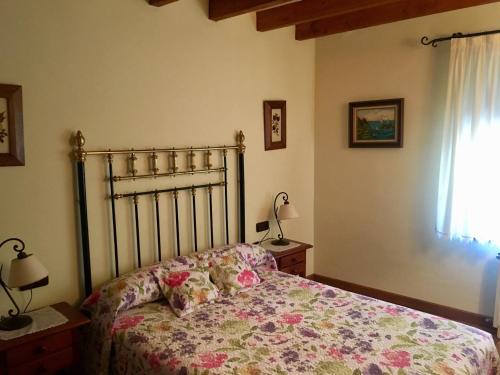 Säng eller sängar i ett rum på Hospedaje Casa Amalia