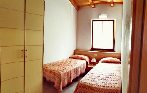 Een bed of bedden in een kamer bij Residenza Cristina
