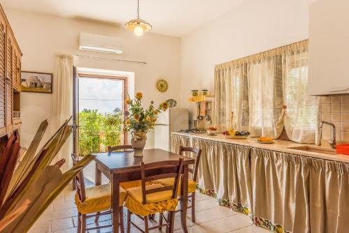 Η κουζίνα ή μικρή κουζίνα στο Casa Vacanze Galatea