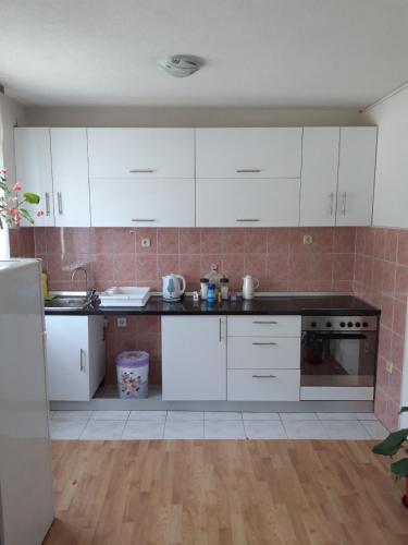 Kuchyň nebo kuchyňský kout v ubytování Apartment Stup