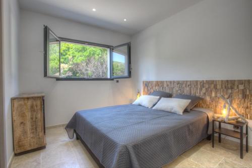 Postel nebo postele na pokoji v ubytování Villa A Luna