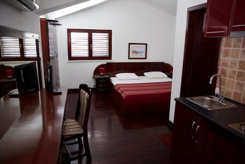 Postel nebo postele na pokoji v ubytování Villa Sara Guesthouse