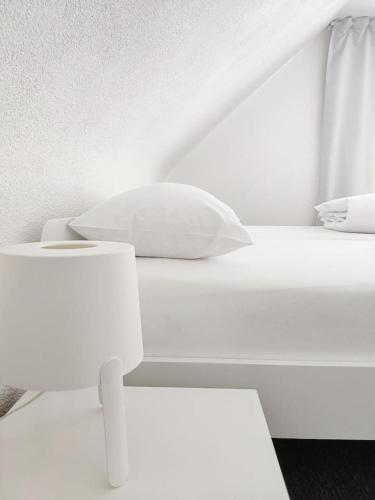 Postel nebo postele na pokoji v ubytování Klimatisiertes Ferienhaus am Bauleuteweg 25