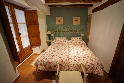 Katil atau katil-katil dalam bilik di Casa rural con mucho encanto en un entorno mágico