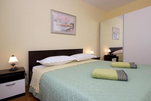 Cama o camas de una habitación en Apartments Mirna