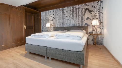 Katil atau katil-katil dalam bilik di Boutique Hotel Olympia