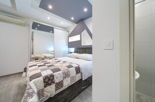 Posteľ alebo postele v izbe v ubytovaní Luxury VALL Apartment