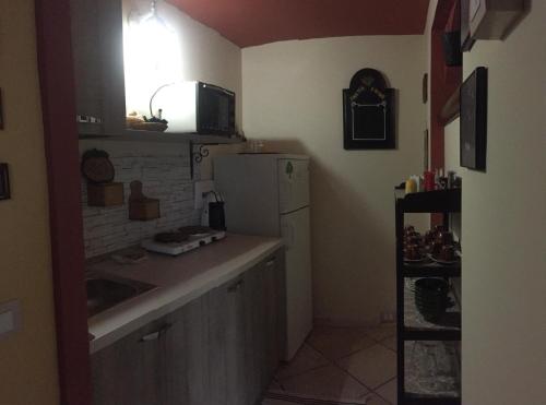 Η κουζίνα ή μικρή κουζίνα στο B&B degli Ottimati