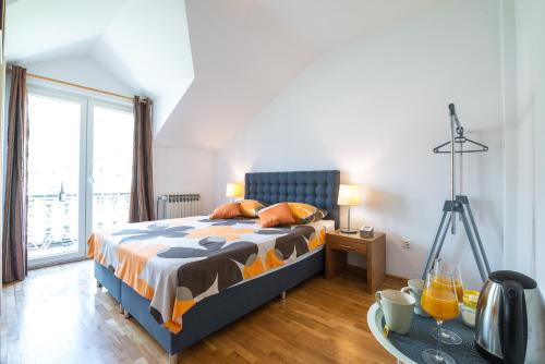 Postel nebo postele na pokoji v ubytování Francesca Guesthouse