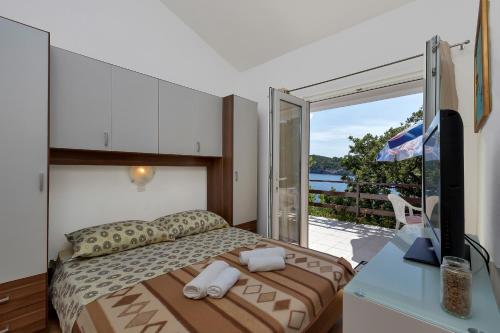 Posteľ alebo postele v izbe v ubytovaní Villa Ruža
