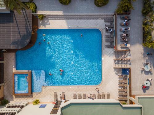 a pool with a swimming pool and a swimming pool at Barceló Guatemala City in Guatemala