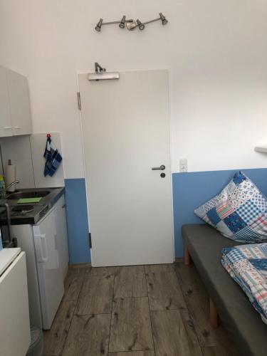 Kuchyň nebo kuchyňský kout v ubytování Fremdenzimmer Sas