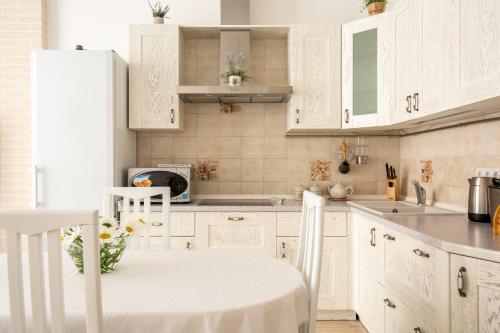 Η κουζίνα ή μικρή κουζίνα στο Apartament First Line