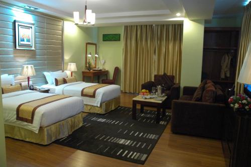 Postel nebo postele na pokoji v ubytování Best Western Green Hill Hotel