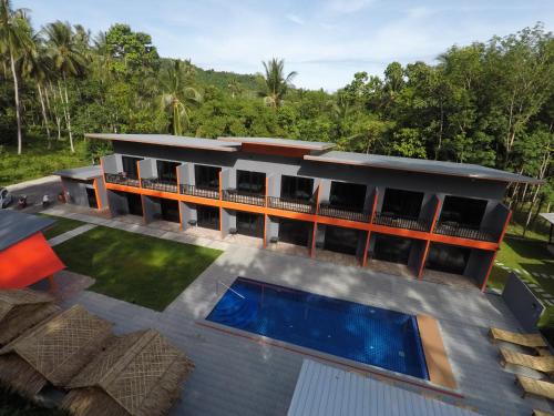 an aerial view of a house with a swimming pool at Samui Hills in Taling Ngam Beach