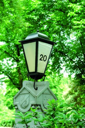 a street light with the number on it at Hotel Miramar in Hamburg