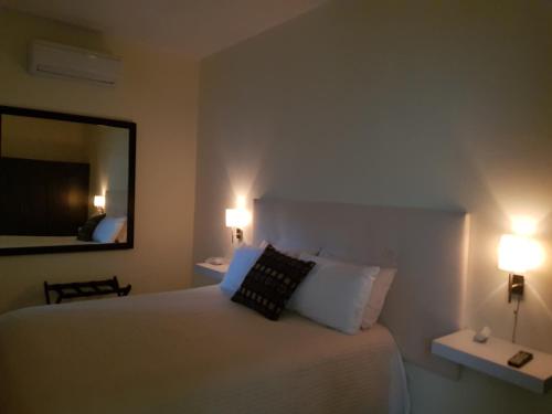 Een bed of bedden in een kamer bij Apartamento Platinum