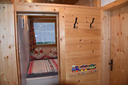 a tiny house with a small cabin with a window at Apartment Krobath in Murau