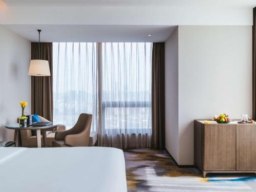 Pullman Fuzhou Tahoeにあるベッド