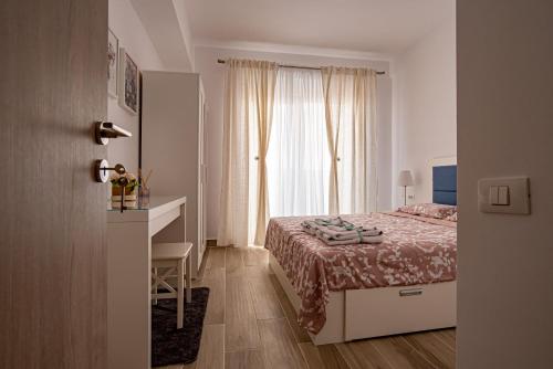 Giường trong phòng chung tại Luxury Seaside Apartament - Marina Surf Mamaia