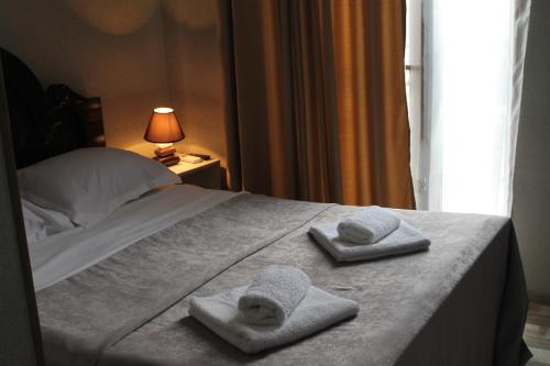 Hotel Tskhumiにあるベッド