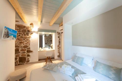 A bed or beds in a room at PERDAS ROOMS