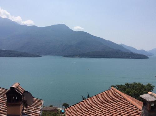 a view of a large body of water with mountains at Casa Ninou in Domaso