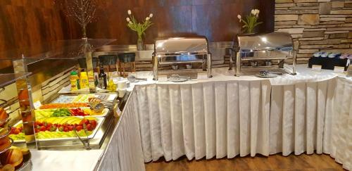 Restoran atau tempat lain untuk makan di Apartman Bella
