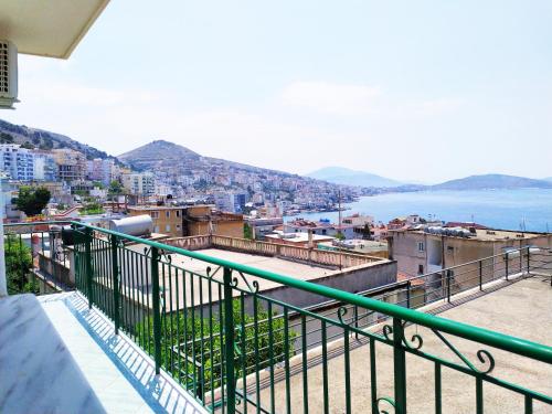a view of a city from a balcony at Joen Apartments in Sarandë