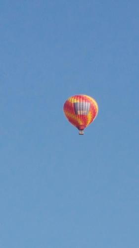 a hot air balloon flying in the sky at Vila Julija in Bled