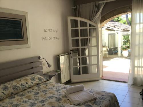 Postel nebo postele na pokoji v ubytování Villa Ghirardelli