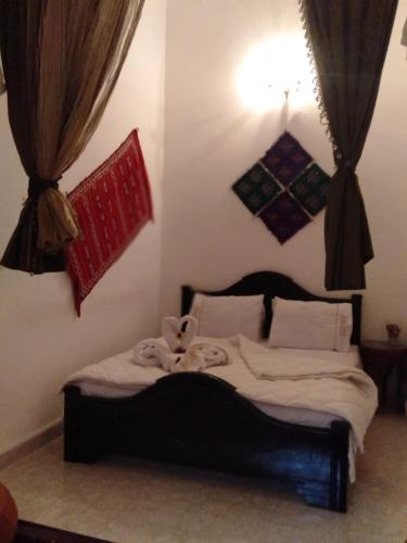 Cama o camas de una habitación en Dar Tsouli