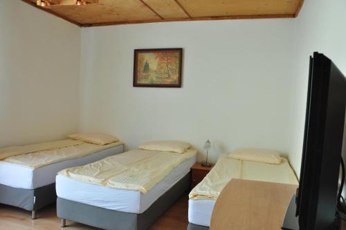 Postel nebo postele na pokoji v ubytování Dom Gościnny Soluch