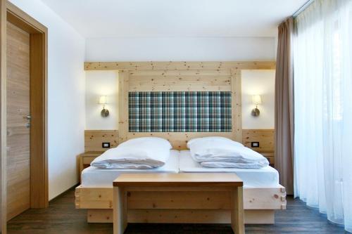 Posteľ alebo postele v izbe v ubytovaní B&B La Tranquillitè