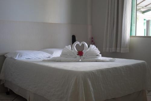 Xingu Praia Hotelにあるベッド