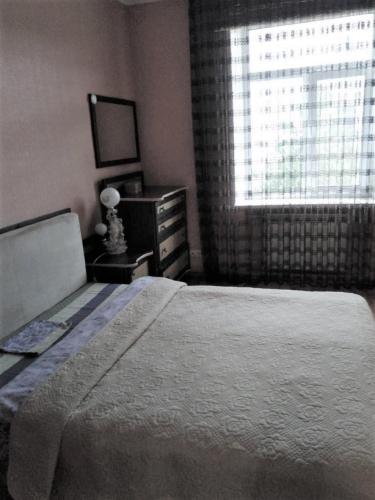 Postel nebo postele na pokoji v ubytování PaulMarie Apartments on Kyrova