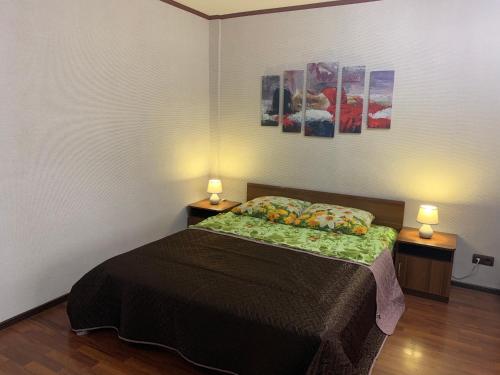 Uma cama ou camas num quarto em Apartment LUX in the center