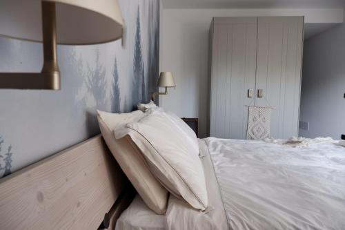 Postel nebo postele na pokoji v ubytování Appartamenti e B&B Casa Ester