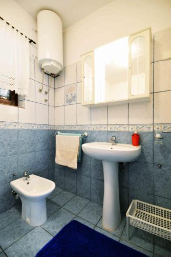 Ένα μπάνιο στο Apartment Zena
