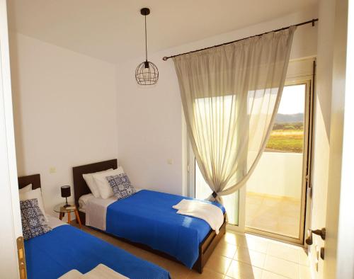 Postel nebo postele na pokoji v ubytování S-EVA RESORT