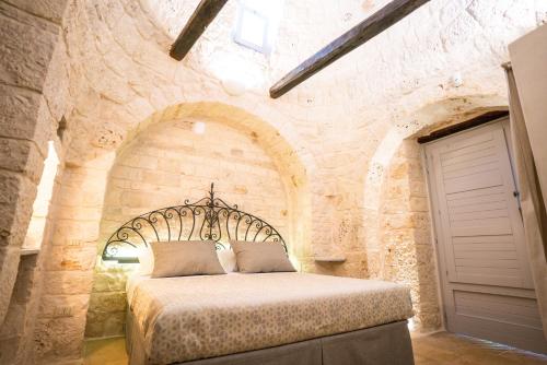 Cama o camas de una habitación en Trulli Ad Maiora