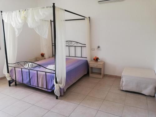 Postel nebo postele na pokoji v ubytování SOLE&MARE agriturismo solo camere