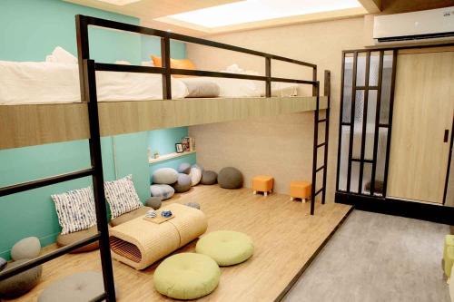 Postel nebo postele na pokoji v ubytování BIRD series B&B&Hostel複合式民宿#本國旅客須先匯款