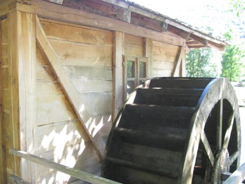 a set of stairs leading into a wooden building at Vodenica Lug in Strmosten